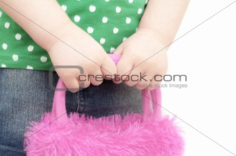 girls hands cares the bag