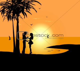 Dancing couple against a sunrise and the sea