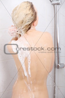 Beautiful woman taking shower 