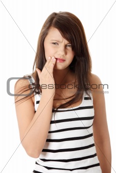 Beautiful young woman is having toothache