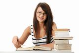 Young student woman with lots of books studing.