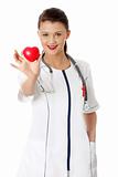 Young female doctor with heart 