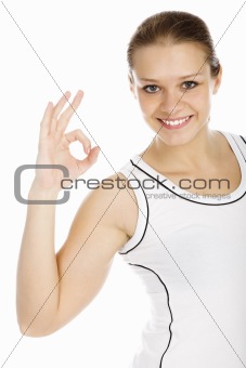 young smiling girl showing OK sign