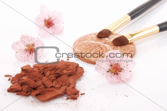 brown powder for makeup and flowers