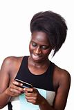 Beautiful Black Woman Typing on Mobile Phone