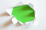 green hole in blank sheet paper