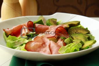 salad with parma ham and avocado, and lettuce