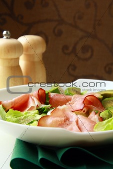 salad with parma ham and avocado, and lettuce