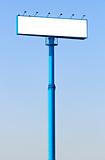 Big blue billboard in a blue sky