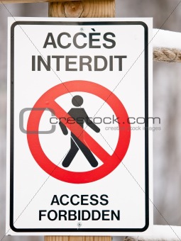Bilingual access forbiden sign