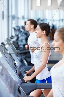 Sports people on treadmills
