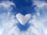 Abstract heart in blue sky.