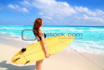 side view surfer woman tropical sea looking waves