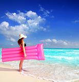  beach woman floating lounge pink tropical Caribbean