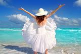 beach rear woman wind shaking white dress