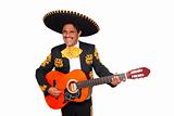 Charro mexican Mariachi playing guitar on white