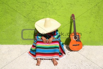 Nap lazy typical mexican sombrero man sitting