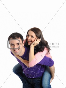 pretty young couple in love embracing. isolated on white