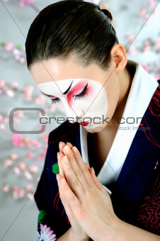 artistic portrait of japan geisha woman with creative make-up 