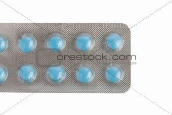 Close-up of a pack of blue pills 