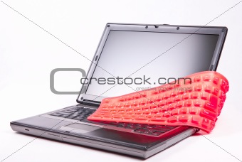 laptop and flexible magenta keyboard 