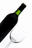 bottle of wine and wineglass on white background