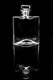 empty glass carafe on black