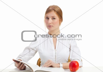 woman with apple and book