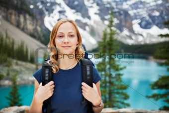 Female hiker with her backpack against scenic view