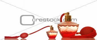 Perfume in a red glass bottles