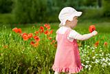 Baby with red flower
