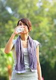 woman drink water after sport