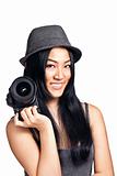 Young asian girl posing with a camera