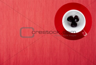 red cup with hearts on the napkin