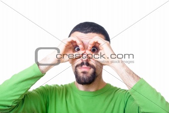 Young Man Looking Through Ring from Fingers Hands