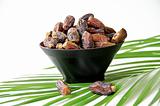 Plate full of Dates Fruit isolated on white Background