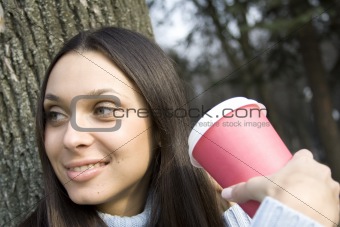 Closeup of woman drinking coffee
