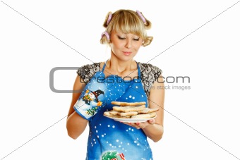 Closeup of a woman with a plate of cookies