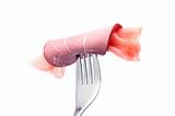 Ham and ginger on a fork