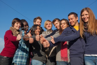 Happy College Students with Thumbs Up
