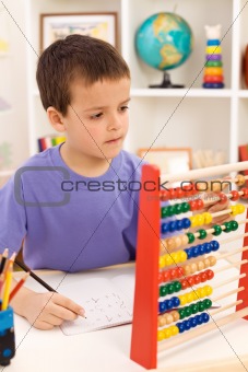 Kid doing math exercise