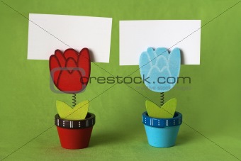 Two pegs in the form of tulips for the notes