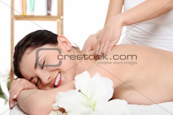 Attractive young woman getting spa treatment