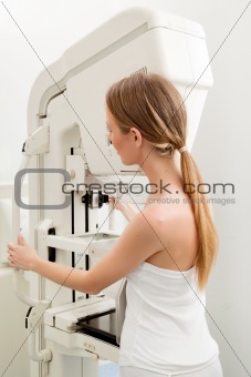 Woman Taking Mammogram