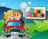 Just married couple driving car