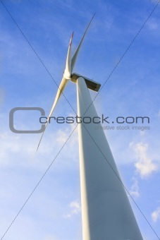 wind turbine generating electricity on blue sky 