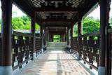 Traditional Chinese architecture, long corridor in outdoor park 