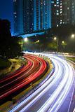 traffic in city at night in hong kong