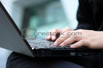 young man works for a laptop 