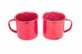Two vintage red metal cups
